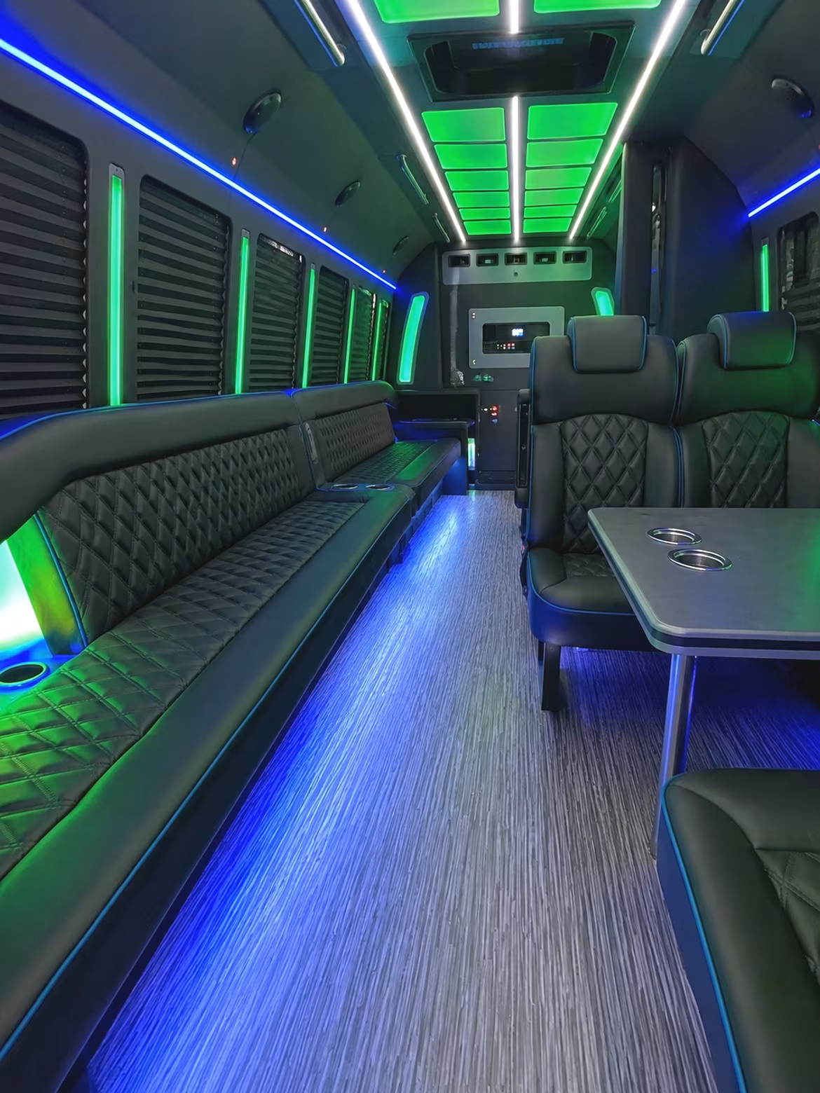 Friends laughing during a party bus celebration in Murrieta