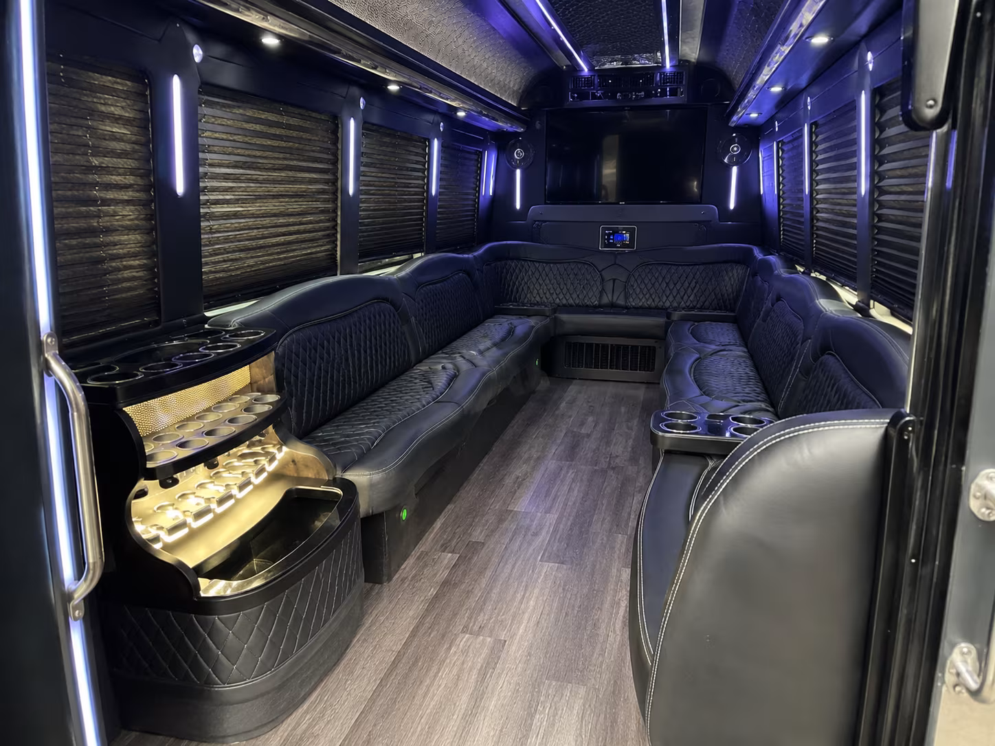 Wedding guests seated inside a party bus serving Murrieta