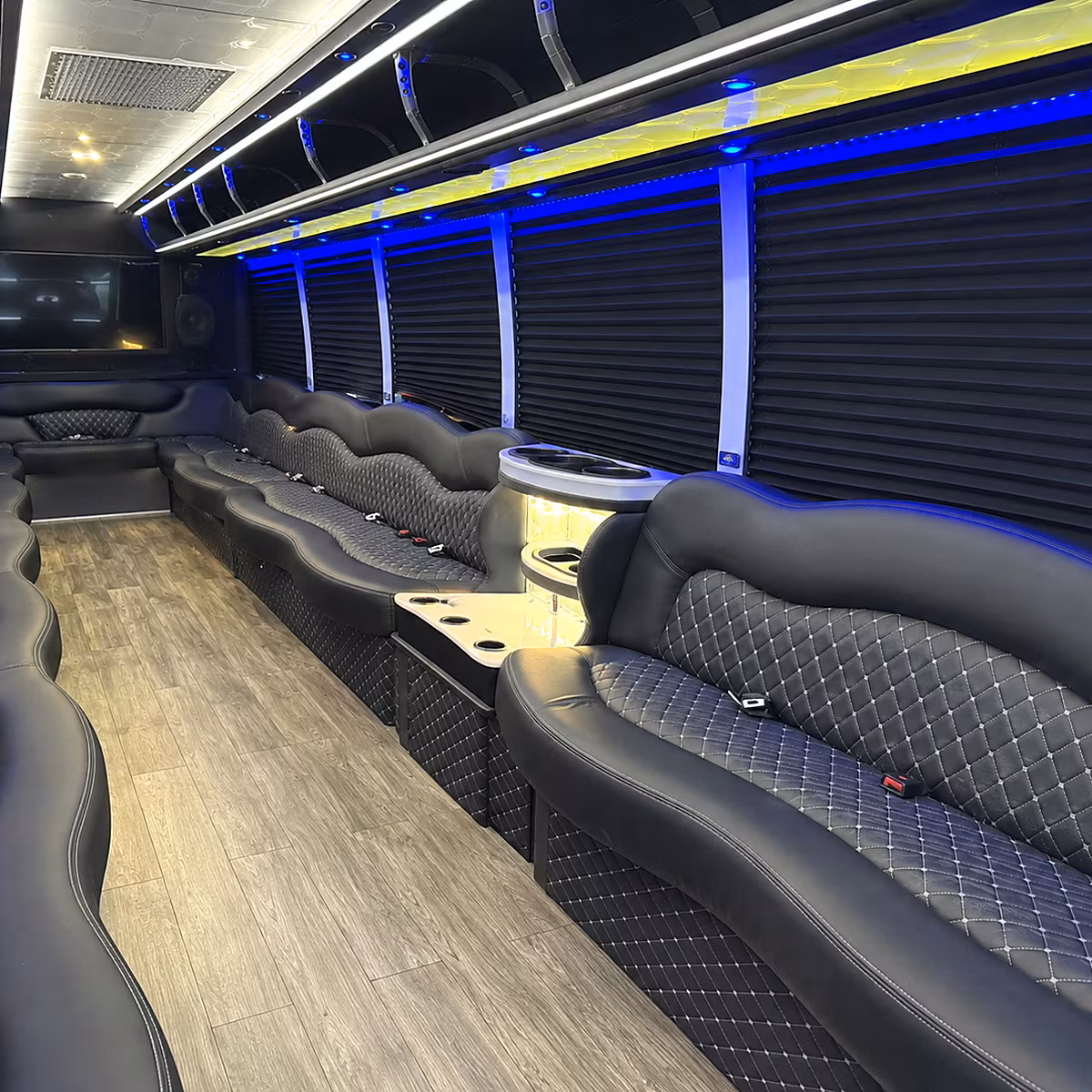 Passenger seating aboard a party bus rental serving Murrieta